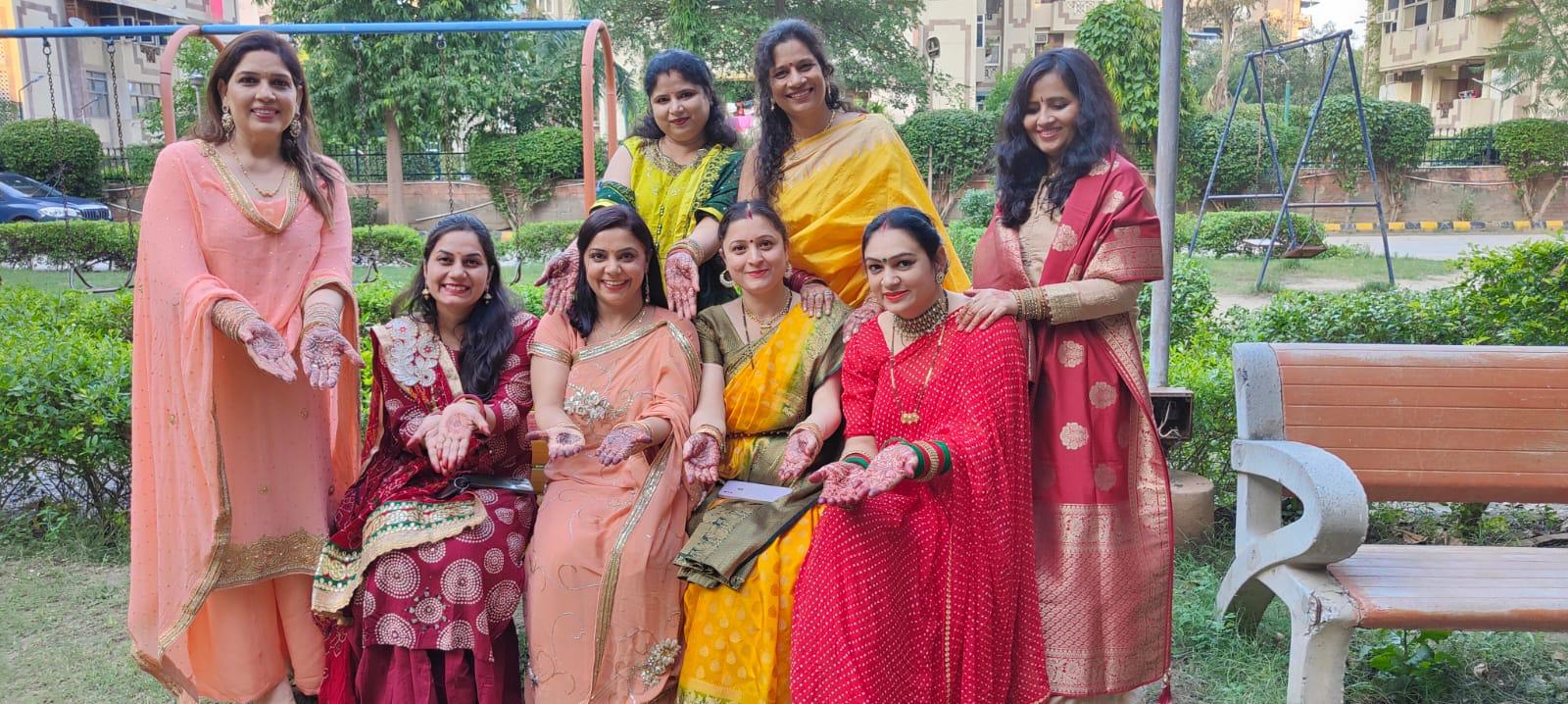 Residents showing mehendi during Karwachauth