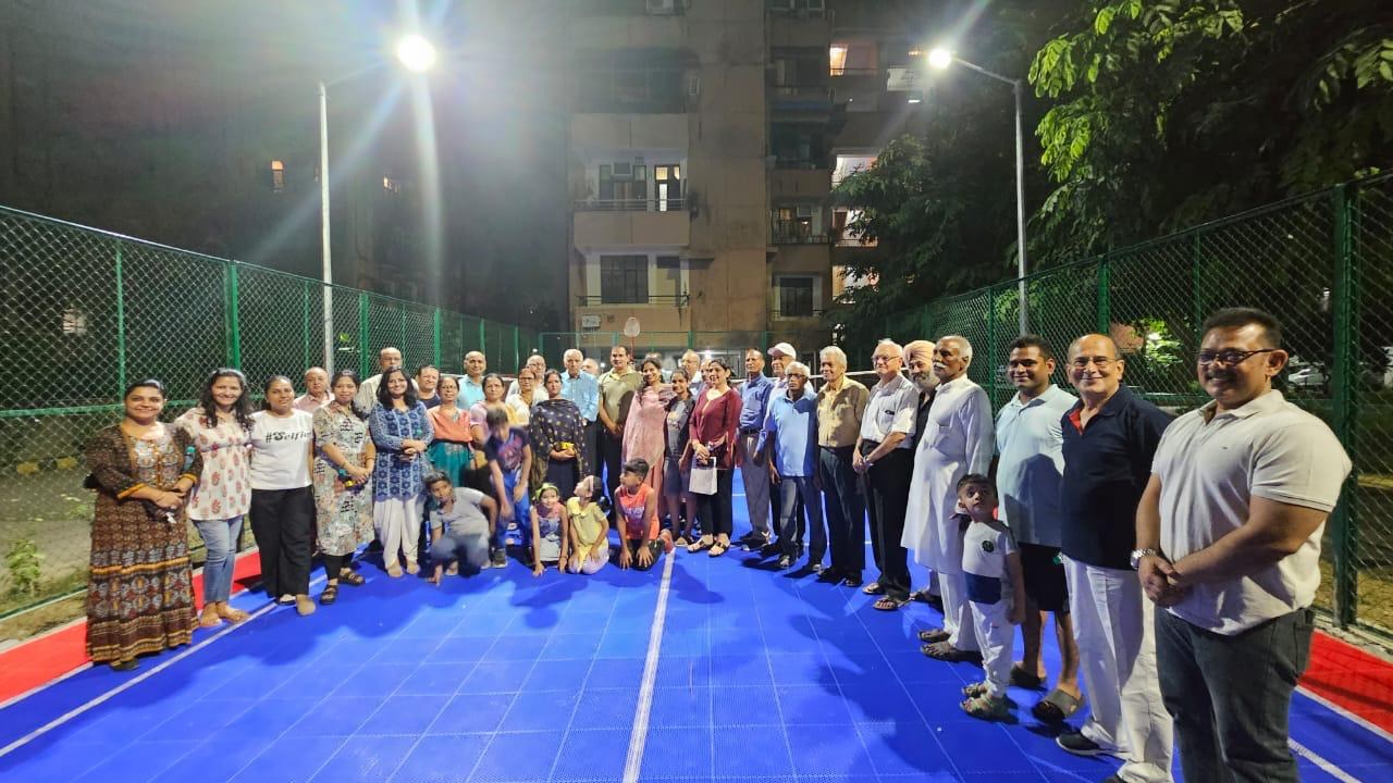 Community gathering at the Shivalika sports court